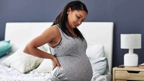 Болі в спині і попереку під час вагітності